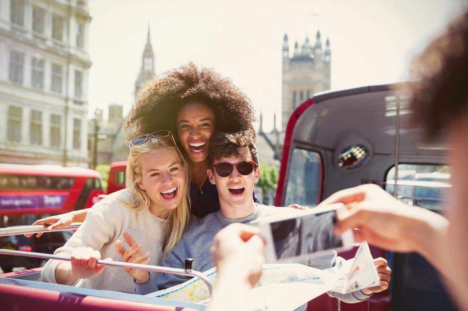 A selfie on a double-decker bus