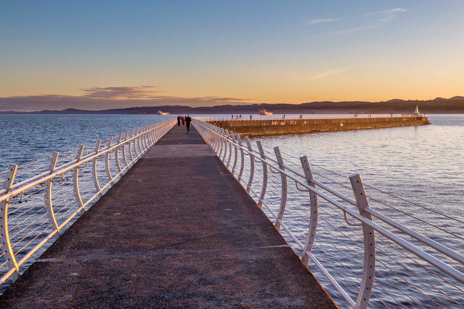 Watch the sunset from Ogden Point