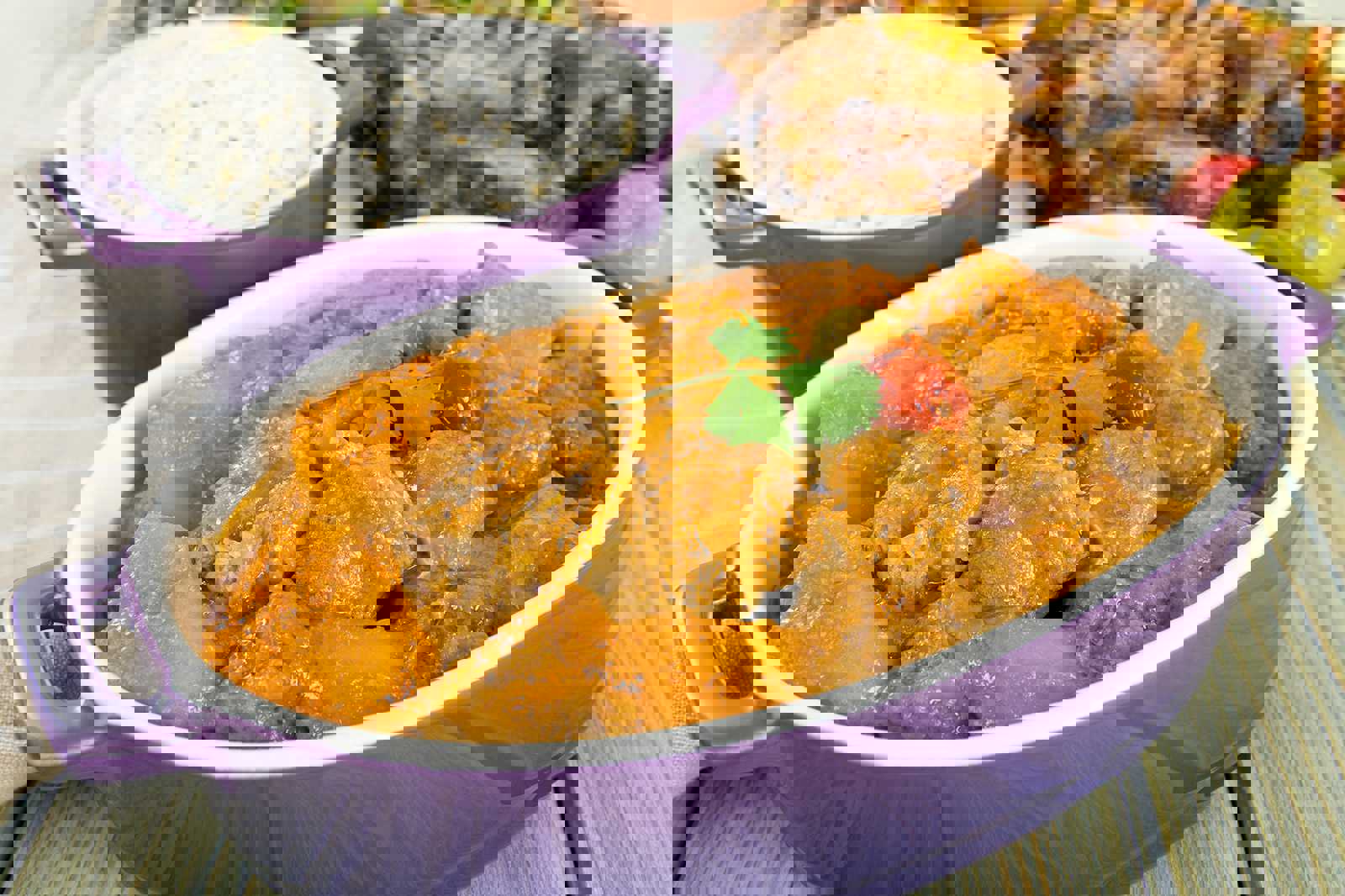 Eat traditional goat stew