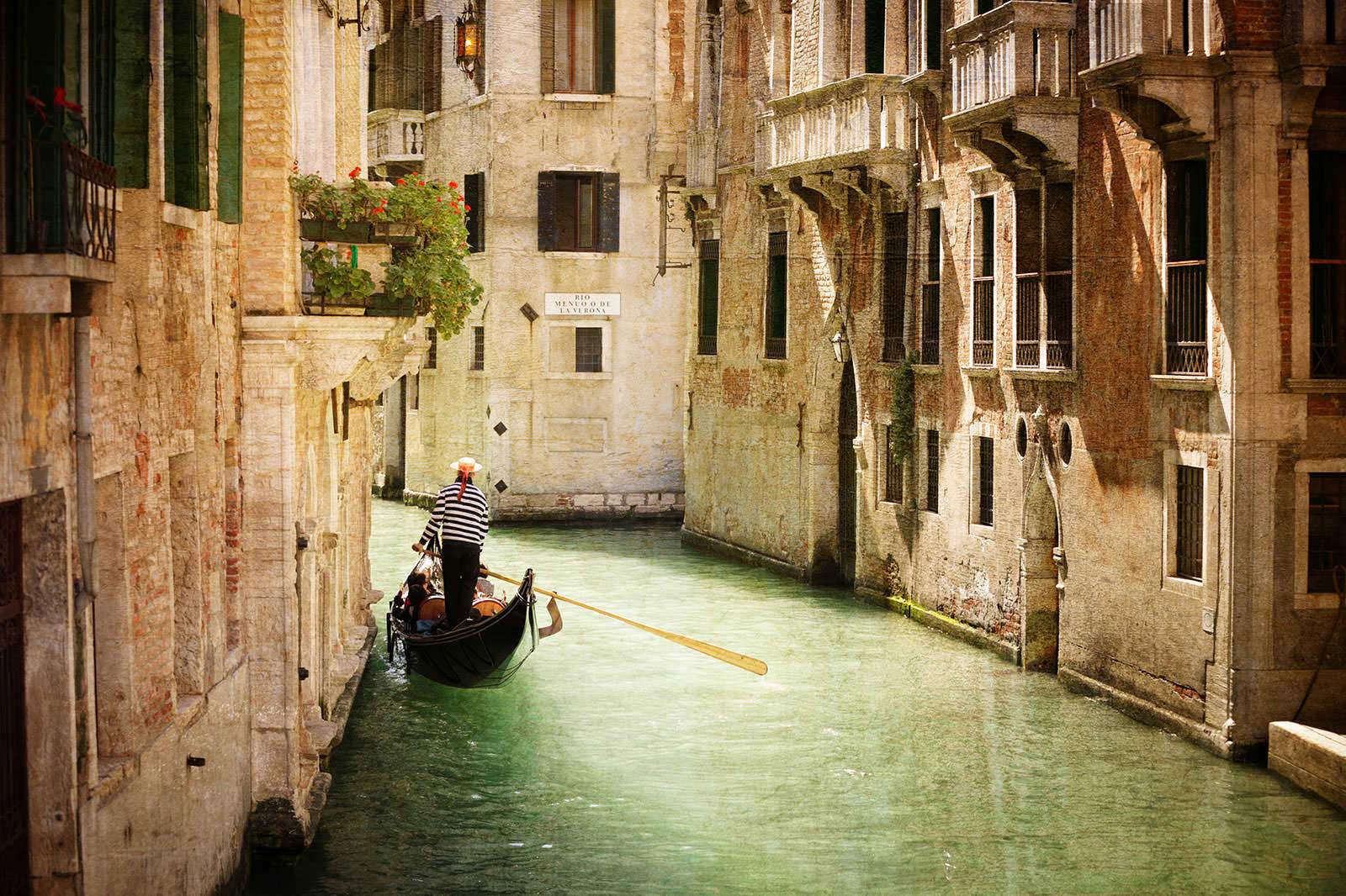 Gondolier and little canals