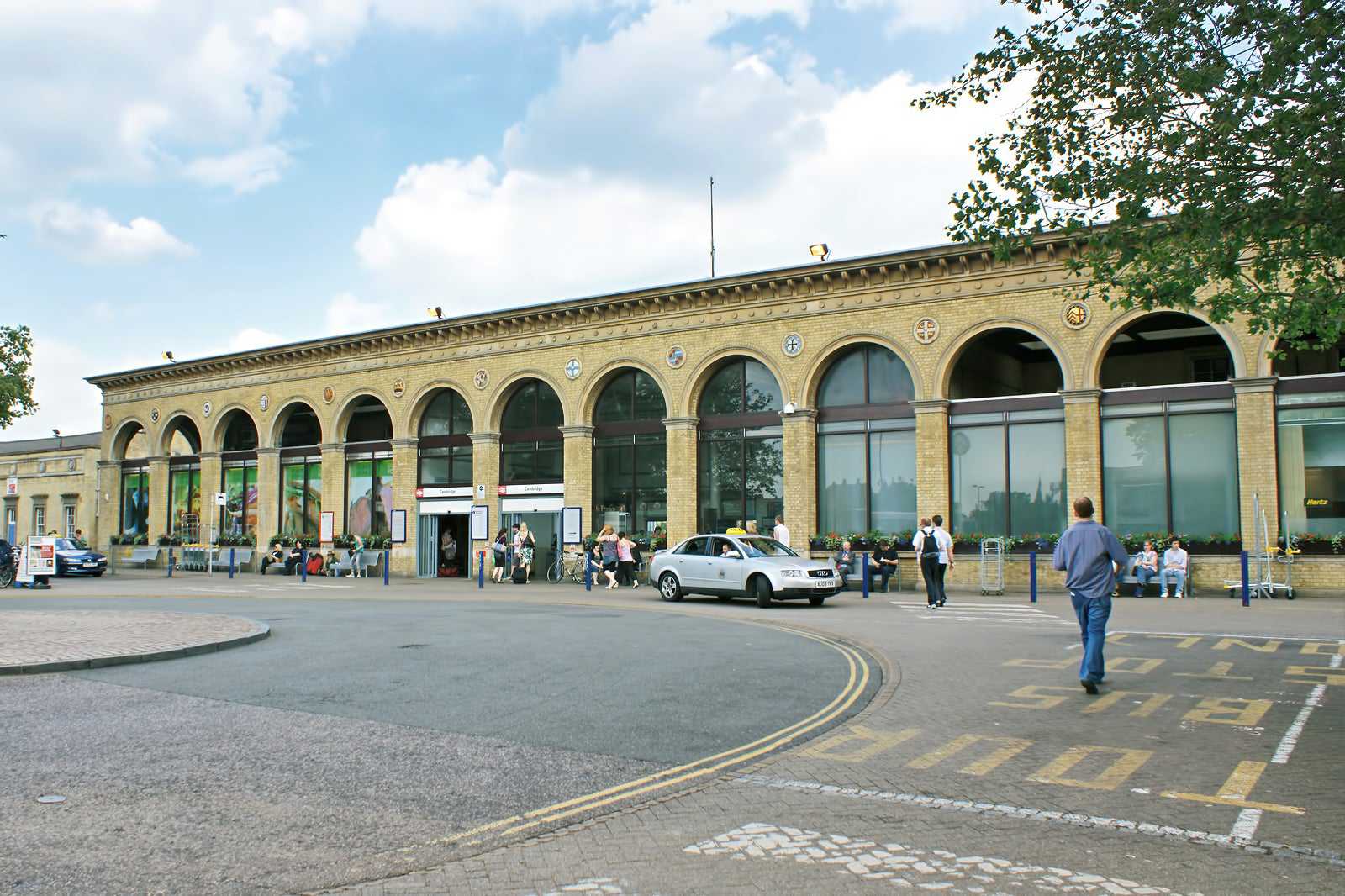 Arrive in Cambridge by train